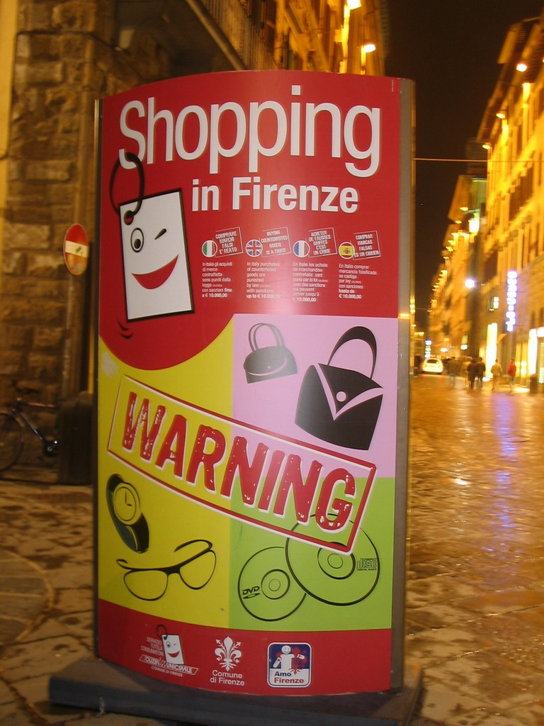 Sign about shopping in Florence, in the city center