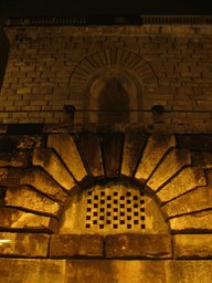 Old wall in the city center, by night