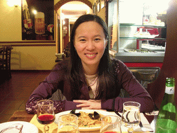 Miaomiao`s friend eating spaghetti at the La Grotta di Leo restaurant