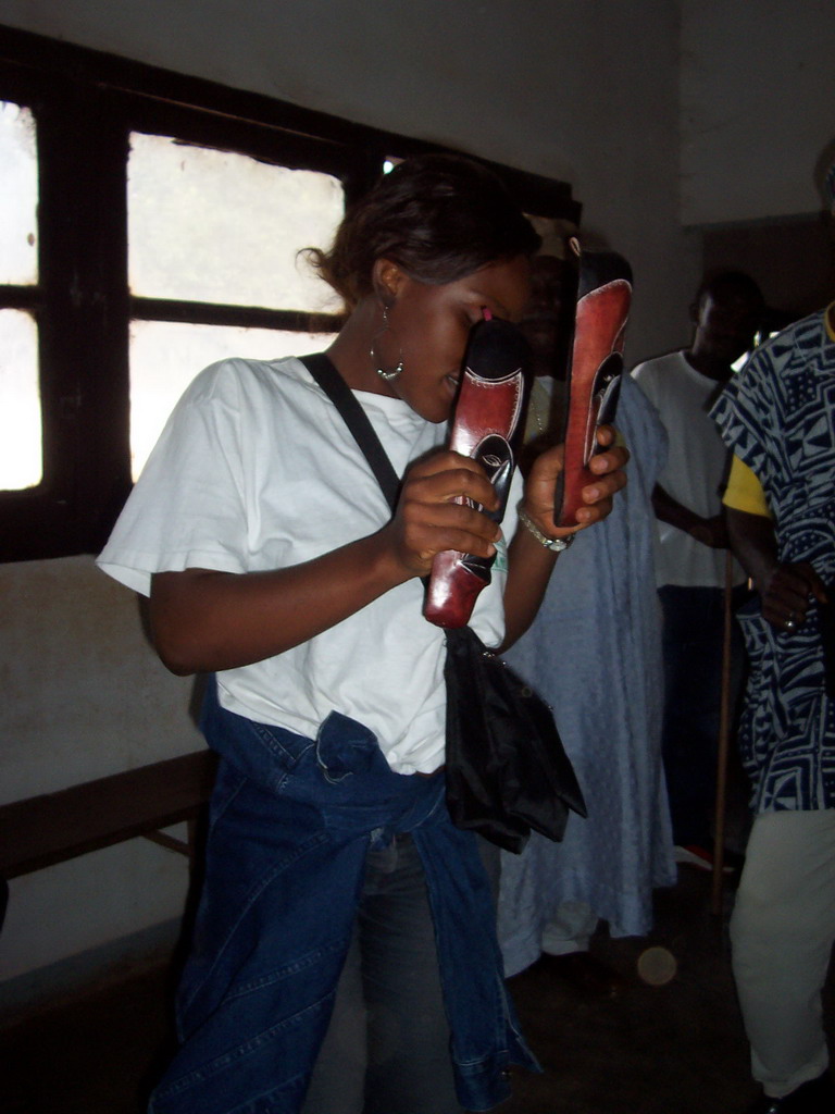 Our friend making music at the Foumban Royal Palace