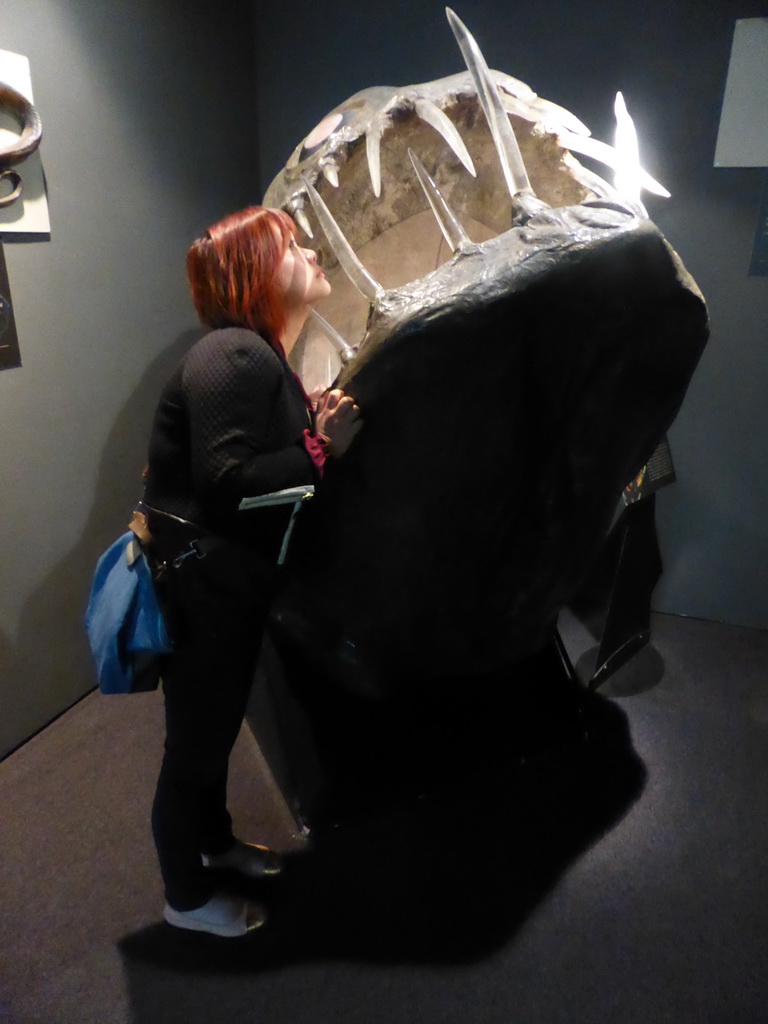 Miaomiao with a fish statue at the Aquarium of Genoa