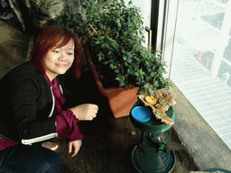 Miaomiao with a Hummingbird in the Hummingbird`s Forest at the Aquarium of Genoa