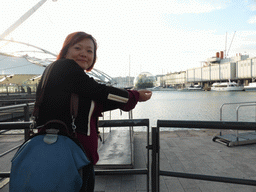 Miaomiao at the Old Harbour with the Piazza delle Feste square, the Biosphere of Genoa and the Aquarium of Genoa