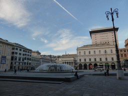 The Piazza de Ferrari square with a fountain and the Carlo Felice Opera Theatre