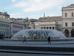 The Piazza de Ferrari square with a fountain and the Carlo Felice Opera Theatre