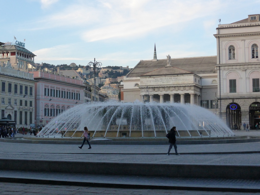 The Piazza de Ferrari square with a fountain and the Carlo Felice Opera Theatre