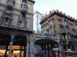 Buildings and gate at the Via XX Settembre street, at sunset