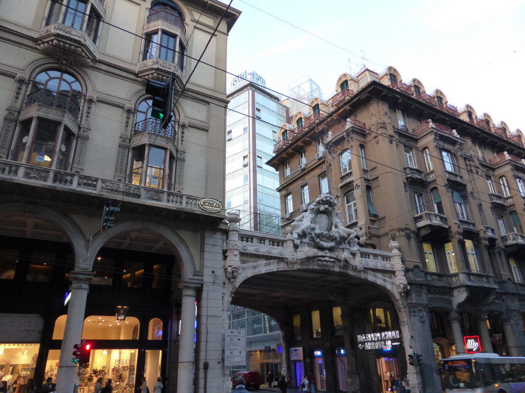 Buildings and gate at the Via XX Settembre street, at sunset