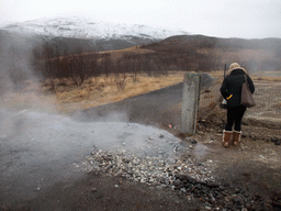 Miaomiao at a small geyser alongside the Biskupstungnabraut road