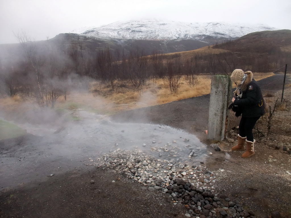 Miaomiao at a small geyser alongside the Biskupstungnabraut road