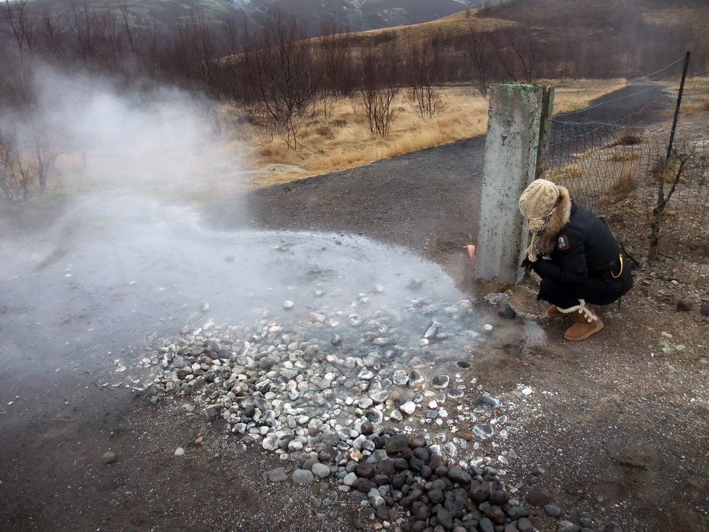 Miaomiao at a small geyser alongside the Biskupstungnabraut road