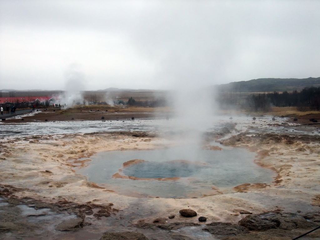 The Strokkur geyser and several small geysers at the Geysir geothermal area