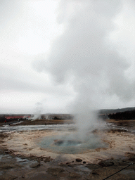 The Strokkur geyser and several small geysers at the Geysir geothermal area