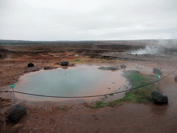 The Konungshver geyser and the Geysir geyser at the Geysir geothermal area