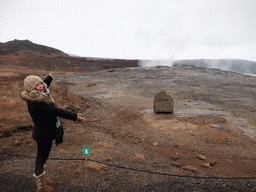 Miaomiao with the Geysir geyser at the Geysir geothermal area