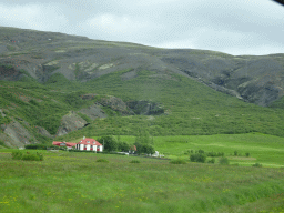 The Miðdalsvöllur golf course and mountains, viewed from the rental car on the Laugarvatnsvegur road