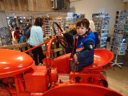 Max on the tractor in the souvenir shop of the Geysir Center