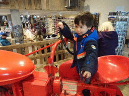 Max on the tractor in the souvenir shop of the Geysir Center