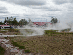 The Geysir Center and several small geysers at the Geysir geothermal area