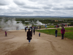 Miaomiao, Max and Miaomiao`s mother at the Geysir geothermal area with the Blesi, Fata and Strokkur geysers