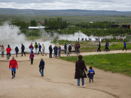 Miaomiao, Max and Miaomiao`s mother at the Geysir geothermal area with the Blesi, Fata and Strokkur geysers