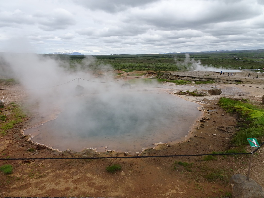 The Konungshver geyser and the Geysir geyser at the Geysir geothermal area