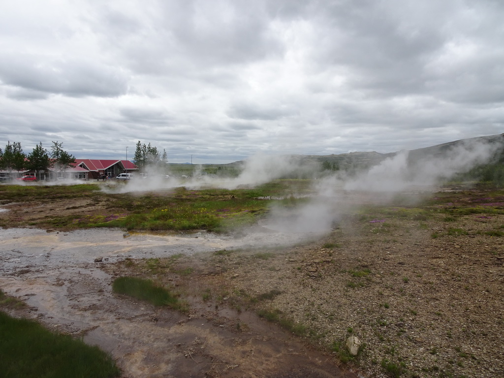 The Geysir Center and several small geysers at the Geysir geothermal area