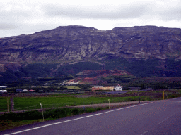 The Biskupstungnabraut road, mountains and the Geysir geothermal area, viewed from the rental car