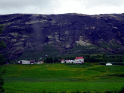 Farm and mountains, viewed from the rental car on the Laugarvatnsvegur road to Selfoss