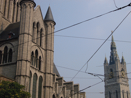 South side of the Sint-Niklaaskerk church and the Belfry of Ghent, viewed from the Korenmarkt square