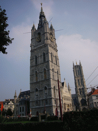 The Emile Braunplein square, the Belfry of Ghent, the Lakenhalle building and the tower of the Sint-Baafs Cathedral