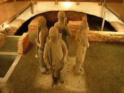 Statues and excavated walls at the Secrecy Room in the basement of the Belfry of Ghent