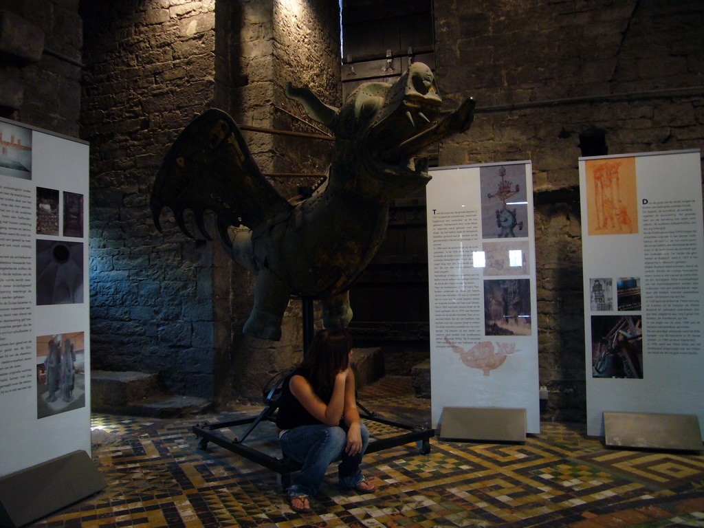 Miaomiao in front of a dragon statue at the Tower Keepers Room at the first floor of the Belfry of Ghent