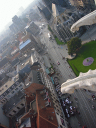 Gargoyles and the city center with the Emile Braunplein square, the Sint-Niklaaskerk church and the Sint-Michielskerk church, viewed from the walkway at the fourth floor of the Belfry of Ghent