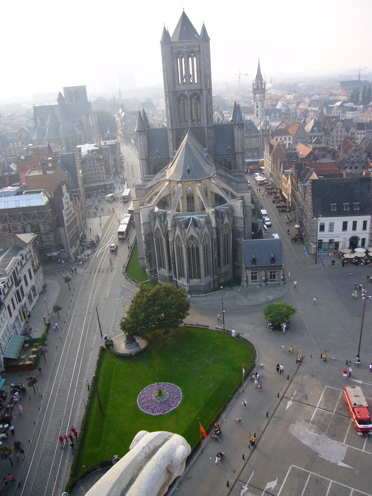 Gargoyle and the city center with the Emile Braunplein square, the Sint-Niklaaskerk church and the Sint-Michielskerk church, viewed from the walkway at the fourth floor of the Belfry of Ghent