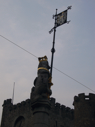 Lion statue at the Sint-Veerleplein square and the front of the Gravensteen Castle