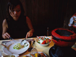 Miaomiao having fondue at the `t Gents Fonduehuisje restaurant