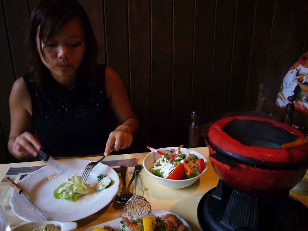 Miaomiao having fondue at the `t Gents Fonduehuisje restaurant