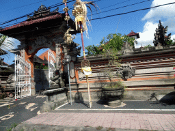 Gate of a temple at the Jalan Raya Ketewel street at Ketewel, viewed from the taxi
