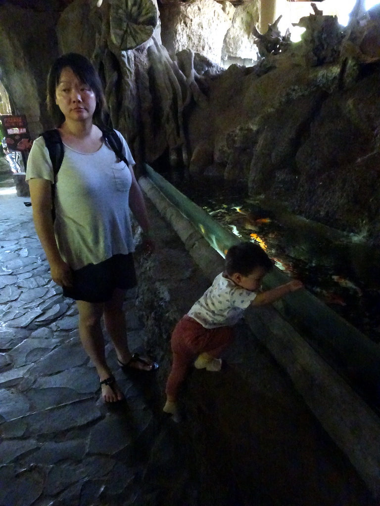 Miaomiao and Max with fish at the Freshwater Aquarium of the Bali Safari & Marine Park