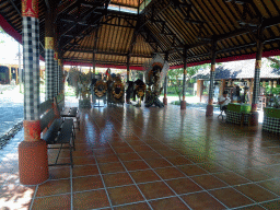 Balinese costumes and decorations at the Bale Banjar pavilion at the Bali Safari & Marine Park