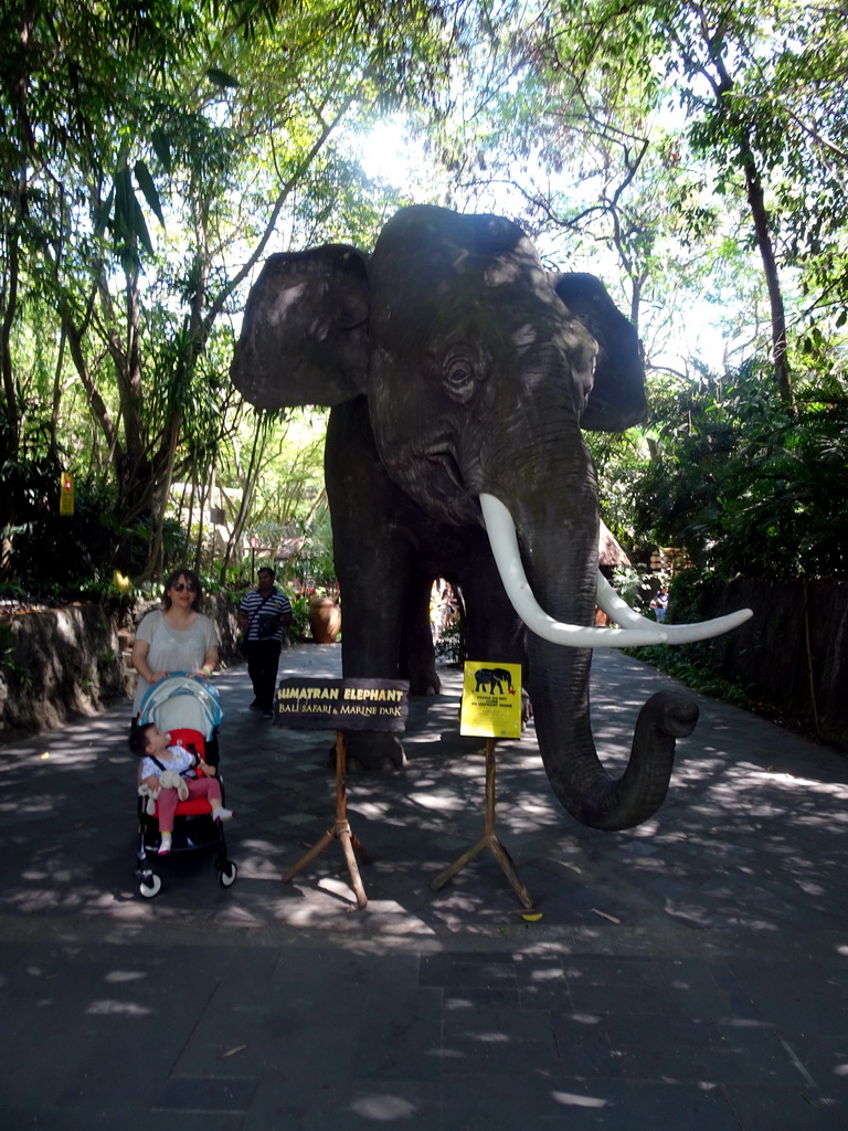 Miaomiao and Max with a statue of a Sumatran Elephant at the Bali Safari & Marine Park