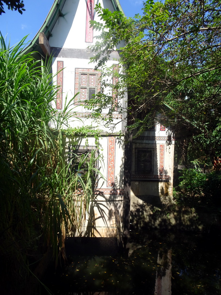 House with decorations, viewed from the safari bus at the Bali Safari & Marine Park