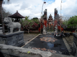 Temple at the Jalan A. A. Gede Rai street, viewed from the taxi to Ubud