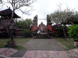 Temple at the Jalan Raya Sukawati street, viewed from the taxi from Ubud