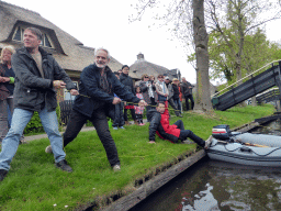 Tourists trying to get a boat unstuck on the Binnenpad canal, viewed from our tour boat