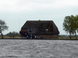 The Kraggehuis holiday home on an island in the Bovenwijde lake, viewed from our tour boat