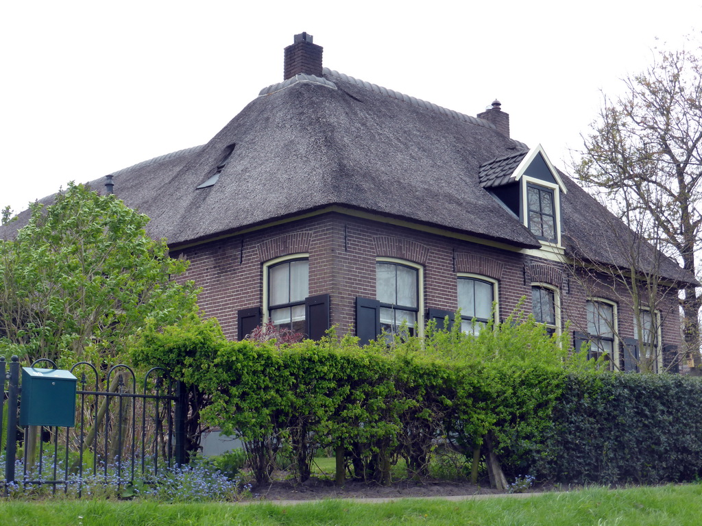 House with camel roof at the Binnenpad canal, viewed from our tour boat