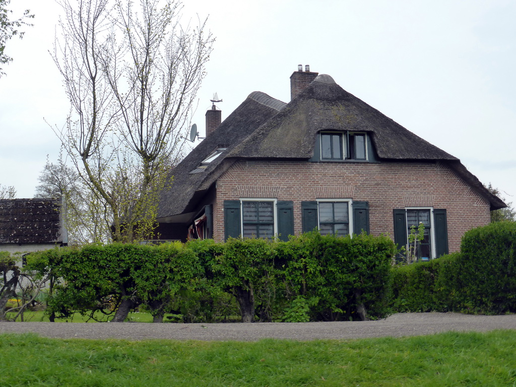 House with camel roof at the Binnenpad canal, viewed from our tour boat