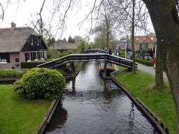 Boats, houses and bridges over the south side of the Binnenpad canal, viewed from a bridge over the Binnenpad canal